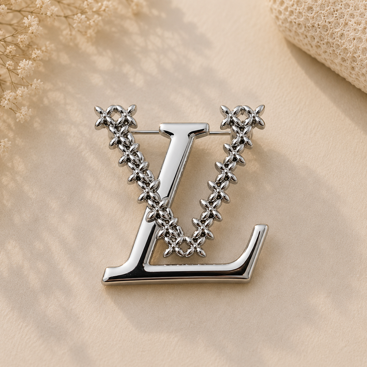 Silver LV Brooch